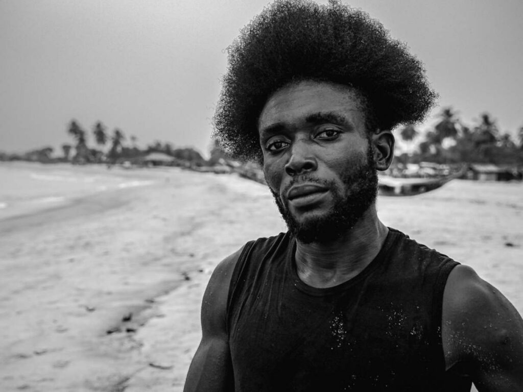 Portrait of a young man on a beach in Liberia