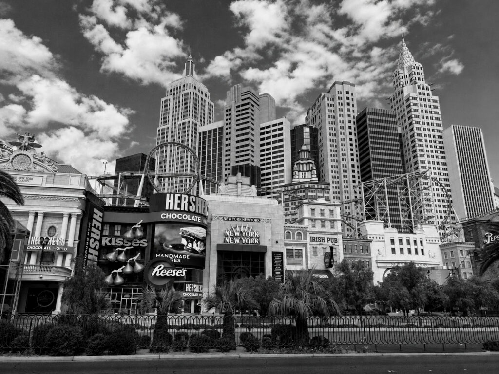 The New York-New York resort in Las Vegas reproduces a Manhattan-style skyline, turning recognisable architecture into a constructed tourist spectacle.