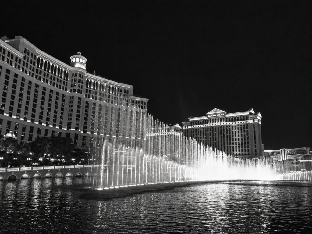 Illuminated fountains rise in front of the Bellagio in Las Vegas, staging a display of water and light in the desert city.