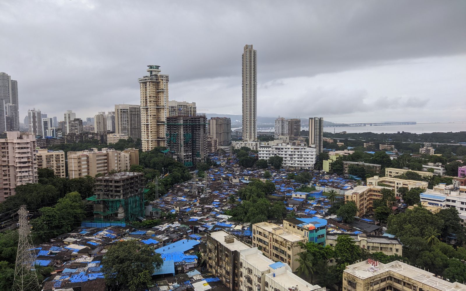 Mumbai skyline with high-rise towers beside dense older housing