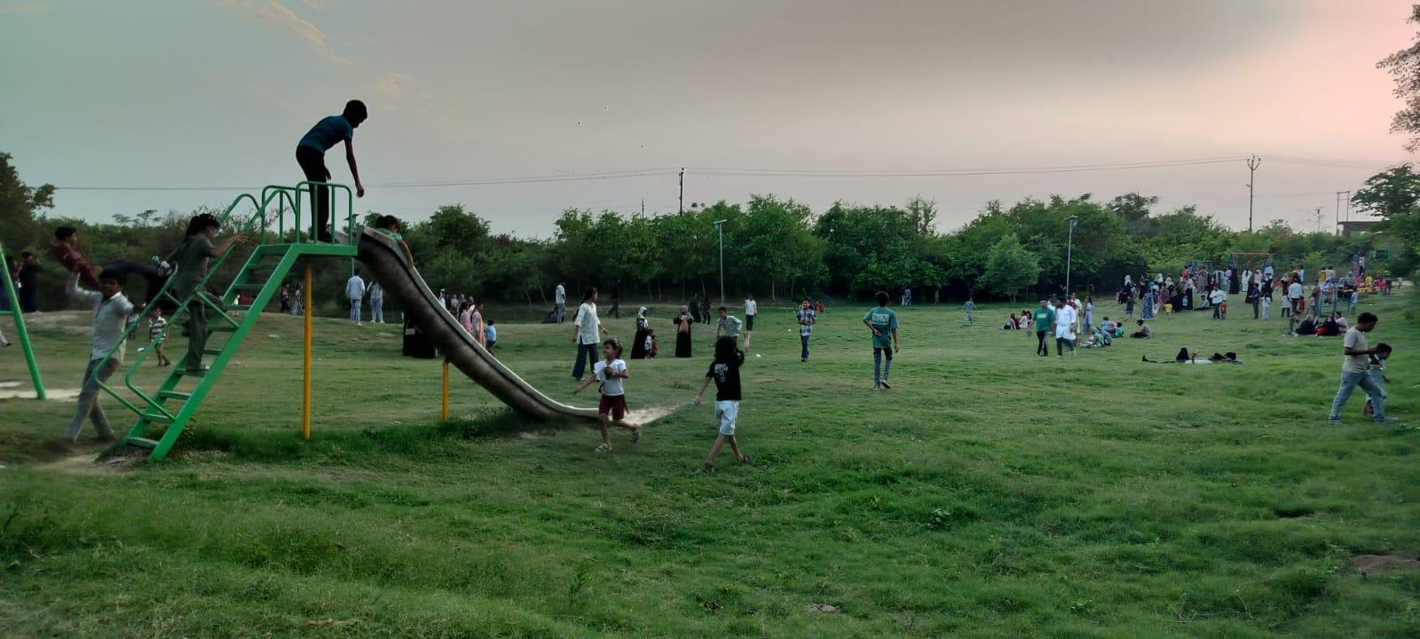 Visitors and children at the playground of Etawah Nagar Van