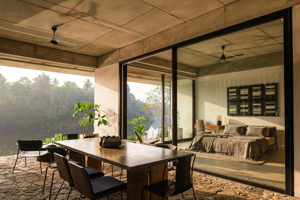 The dining patio and a ground-floor bedroom open towards the water. Photo: Praveen Mohandas