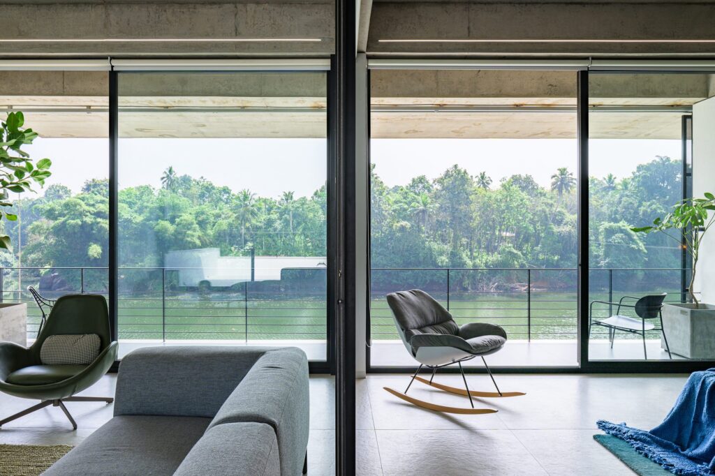 The first-floor family living area looks out over the river. Photo: Praveen Mohandas