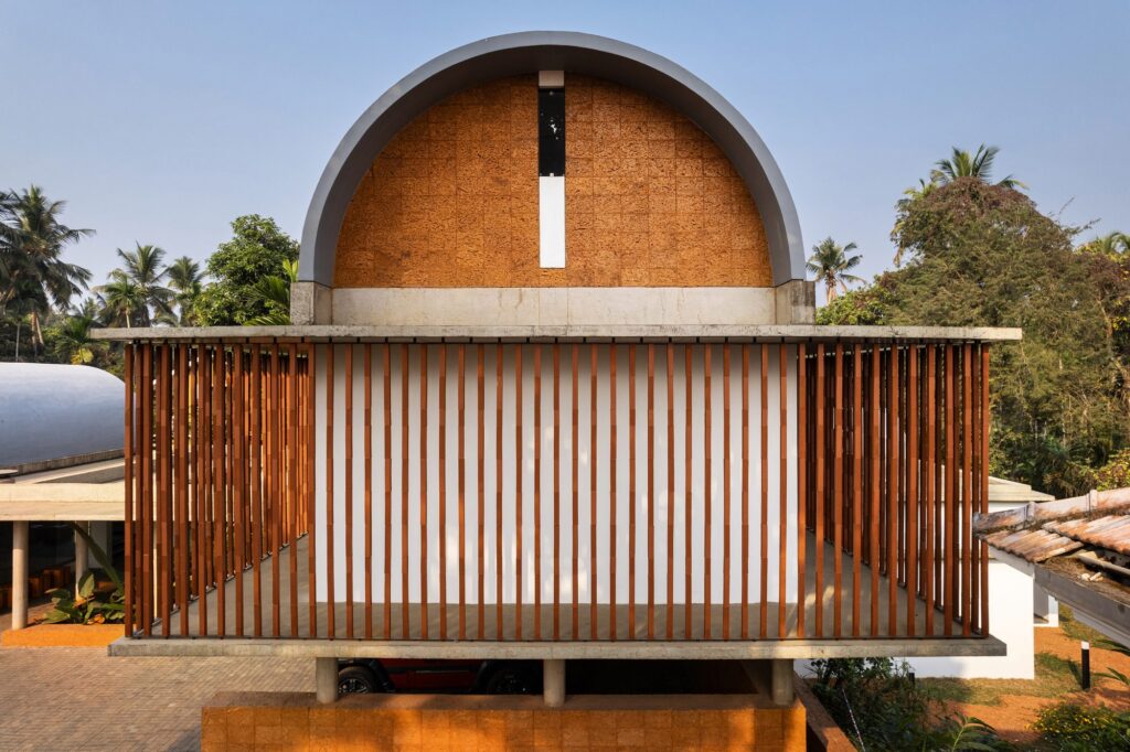 The fluted terracotta screen wraps the upper floor. Photo: Turtle Arts Photography
