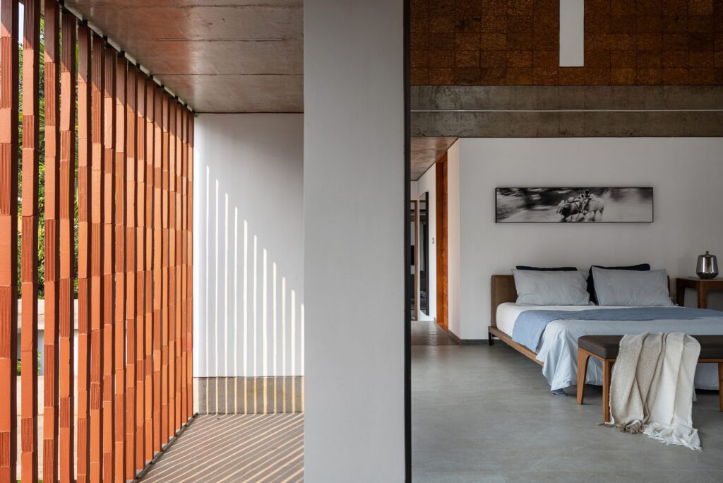 The master bedroom opens to the screened passage. Photo: Turtle Arts Photography